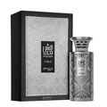 Zimaya Modhesh Noble 100ml — A silver patterned gift box stands next to a matching silver patterned perfume bottle with a metallic cap, both on a white background. | Zimaya Modhesh Noble 100ml — Kotak hadiah bercorak perak berdiri di sebelah botol minyak wangi bercorak perak yang sepadan dengan penutup logam