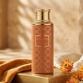 Maison Asrar Monarch by Maison Asrar 100ml EDP Unisex — Orange bottle with gold geometric pattern and gold fluted cap, featuring a central label with 'MONARCH ROYAL COLLECTION'.