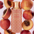 Maison Asrar Monarch by Maison Asrar 100ml EDP Unisex — Orange bottle with gold geometric pattern and gold fluted cap, featuring a central label with 'MONARCH ROYAL COLLECTION'.