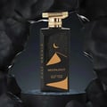 Gulf Orchid Moonlight Eau De Parfum — Black bottle with gold desert dunes and crescent moon design, gold cap | Gulf Orchid Moonlight Eau De Parfum — Botol hitam dengan reka bentuk bukit pasir emas dan bulan sabit, penutup emas