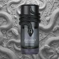 Lattafa Musamam Black Intense — A black snake coiled around the cap of a dark glass perfume bottle, resting on a textured black stand with a snake-skin pattern. | Lattafa Musamam Black Intense — Seekor ular hitam melingkar di sekeliling penutup botol minyak wangi kaca gelap, diletakkan di atas tapak hitam bertekstur