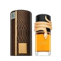 Lattafa Musamam Eau De Parfum 100ml by Lattafa — A gold snake wraps around a clear glass perfume bottle filled with amber liquid, next to a textured brown cylindrical box. | Lattafa Musamam Eau De Parfum 100ml by Lattafa — Ular emas melilit botol minyak wangi kaca jernih berisi cecair ambar, bersebelahan kotak