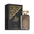 Lattafa Musk Al Aroos by Lattafa 80ml EDP — A black perfume box with gold ornate cutouts and Arabic calligraphy sits next to a dark glass perfume bottle with a gold cap and matching ornate design. | Lattafa Musk Al Aroos by Lattafa 80ml EDP — Kotak minyak wangi hitam dengan potongan berukir emas dan kaligrafi Arab