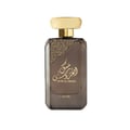 Lattafa Musk Al Aroos by Lattafa 80ml EDP — A black perfume box with gold ornate cutouts and Arabic calligraphy sits next to a dark glass perfume bottle with a gold cap and matching ornate design. | Lattafa Musk Al Aroos by Lattafa 80ml EDP — Kotak minyak wangi hitam dengan potongan berukir emas dan kaligrafi Arab