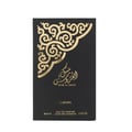 Lattafa Musk Al Aroos by Lattafa 80ml EDP — A black perfume box with gold ornate cutouts and Arabic calligraphy sits next to a dark glass perfume bottle with a gold cap and matching ornate design. | Lattafa Musk Al Aroos by Lattafa 80ml EDP — Kotak minyak wangi hitam dengan potongan berukir emas dan kaligrafi Arab