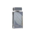 Lattafa Najdia Intense Men Lattafa 100ml EDP — A clear glass perfume bottle with a grey cap and a prominent silver leaf design on the front, placed next to its matching grey and blue box with a similar silver leaf motif.