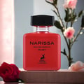 Maison Alhambra Narissa Ruby Rouge Maison Alhambra 100ml — A red perfume bottle and its matching red box are displayed against a white background. | Maison Alhambra Narissa Ruby Rouge Maison Alhambra 100ml — Sebotol minyak wangi merah dan kotak merah yang sepadan dipaparkan berlatarkan putih.