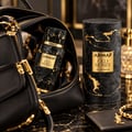 Armaf Old Money by Armaf 100ml EDP Unisex — Black textured bottle with gold accents and matching cylindrical box with gold marble pattern
