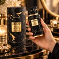 Armaf Old Money by Armaf 100ml EDP Unisex — Black textured bottle with gold accents and matching cylindrical box with gold marble pattern