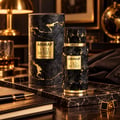 Armaf Old Money by Armaf 100ml EDP Unisex — Black textured bottle with gold accents and matching cylindrical box with gold marble pattern