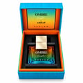 Armaf Ombre Fresh by Armaf 100ml EDP Unisex — Glass perfume bottle with gradient amber-to-teal liquid, gold cap, on a black speckled base, next to its blue gradient box.