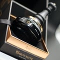Perfume bottle labeled 'King' in a decorative box with gold accents.  King Armaf for men 100ml EDP