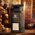 Perfume bottle labeled 'Oud Elixir' by GrifoneLus on a decorative background.
