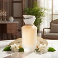 Sham Perfume Woman Gulf Orchid on white marble with pear slices and jasmine; Malaysian daylight; clear bottle and box.