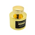 Gold perfume bottle with black label on a white background