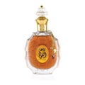 Perfume bottle with intricate design and gold accents on a white background