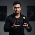 Lelaki Malaysia berbaju hitam memegang Raghba for Men, aura maskulin kuat
