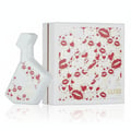 White bottle and box with red lip print and 'LUXE' branding on a white background