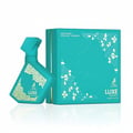 Turquoise perfume bottle and packaging with 'LUXE' branding on a white background