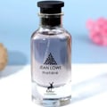 Perfume bottle labeled 'Jean Lowe materie' with a blurred background