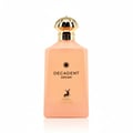 Perfume bottle labeled 'Decadent Dream' with a gold cap on a white background