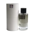 Perfume bottle with black cap and white label next to a cylindrical container on a white background