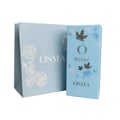 Two light blue boxes with floral designs and 'OSMA' branding on a green background