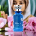 Blue perfume bottle with silver cap on a white background
