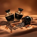 Carino Black by Rue Broca perfume bottle with vanilla pods amber glow women scent Malaysia
