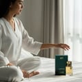 Luminus Pour Femme by Rue Broca perfume bottle on white sheets morning women fragrance Malaysia