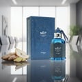 Unisex fragrance bottle on glass boardroom table morning light with pear and ginger – Al Barari Coral Malaysia