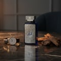 Al Embratur Intense by Zimaya perfume bottle on dark marble with gold watch and amber light men fragrance Malaysia