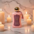 Fatima by Zimaya perfume bottle surrounded by candles on marble vanity amber light Malaysia