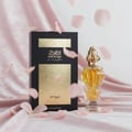 Women’s perfume bottle under falling rose petals blush velvet Malaysia – Infrad Luxe