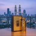 Men’s perfume bottle on KL balcony pre-dawn reflection of skyline – Modhesh Aura Malaysia