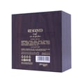 Back of a dark purple perfume box with 'Reserved' branding and product details.