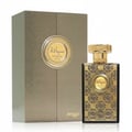 Perfume bottle and packaging with intricate designs on a white background