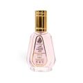 Ard Al Zaafaran Pink Blush Shams Al Emarat Khususi 50ml Perfume — Pink glass perfume bottle with gold spray nozzle and cap, label shows Arabic script and English text, isolated on white background.
