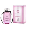 Maison Alhambra Pink Shimmer Secret 100ml — Pink perfume bottle with a black ribbon bow, next to its matching pink striped box, on a white background. | Maison Alhambra Pink Shimmer Secret 100ml — Botol minyak wangi merah jambu dengan reben hitam, bersebelahan kotak berjalur merah jambu yang sepadan, di atas latar