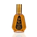 Ard Al Zaafaran Qaed Al Fursan — A gold-capped glass perfume bottle with amber liquid sits next to its black and gold box featuring a running horse graphic. | Ard Al Zaafaran Qaed Al Fursan — Botol kaca bertutup emas dengan cecair berwarna ambar duduk bersebelahan dengan kotak hitam dan emasnya yang menampilkan grafik