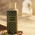 Maison Asrar Regent by Maison Asrar 100ml EDP Unisex — Dark green bottle with gold geometric pattern and gold cap, featuring a gold label with 'REGENT ROYAL COLLECTION' text.