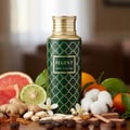 Maison Asrar Regent by Maison Asrar 100ml EDP Unisex — Dark green bottle with gold geometric pattern and gold cap, featuring a gold label with 'REGENT ROYAL COLLECTION' text.