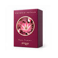 Zimaya Reverie Petals by Zimaya 100ml EDP Women — A woman's hand with dark red nails reaches for the gold cap of a deep red perfume bottle, next to its matching box, surrounded by dark red flowers and delicate white blossoms on a marble surface.