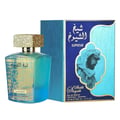 Lattafa Sheikh Al Shuyukh Supreme by Lattafa 100ml — A blue and green faceted glass perfume bottle with a gold textured cap sits next to its blue and light blue patterned box, which features an image of a man in traditional headwear. | Lattafa Sheikh Al Shuyukh Supreme by Lattafa 100ml — Botol kaca berfaset biru dan