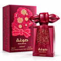 Asdaaf Sougha — Red perfume bottle with gold speckles and ornate floral embossed box with a red bow