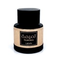 Lattafa Tamima — Black perfume bottle with gold label and black cap, next to a black product box with gold Arabic script and text | Lattafa Tamima — Botol minyak wangi hitam dengan label emas dan penutup hitam, bersebelahan kotak produk hitam dengan skrip Arab emas dan teks