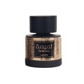 Lattafa Tamima — Black perfume bottle with gold label and black cap, next to a black product box with gold Arabic script and text | Lattafa Tamima — Botol minyak wangi hitam dengan label emas dan penutup hitam, bersebelahan kotak produk hitam dengan skrip Arab emas dan teks