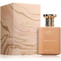 Paris Corner Taskeen Caramel Cascade 100ml — A rectangular perfume box with a marble-like pattern in beige and pink hues, accented with gold glitter stripes and gold text. | Paris Corner Taskeen Caramel Cascade 100ml — Peti minyak wangi berbentuk segi empat dengan corak seperti marmar dalam warna beige dan merah