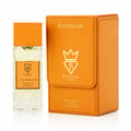Bujairami Too Damn Good — Clear faceted glass perfume bottle with wooden cap next to orange leather box with gold logo
