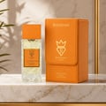 Bujairami Too Damn Good — Clear faceted glass perfume bottle with wooden cap next to orange leather box with gold logo